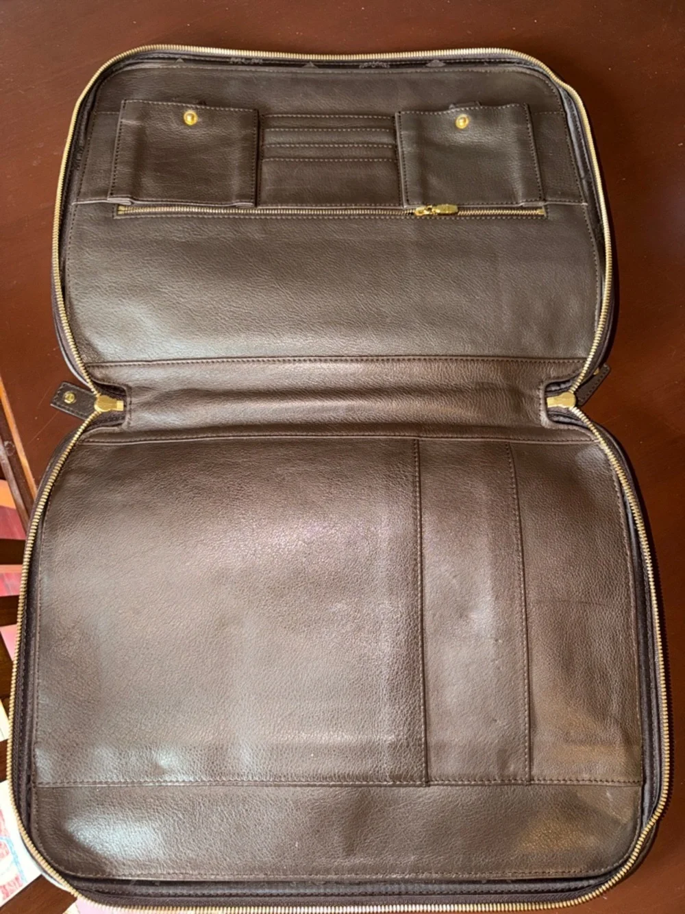 MCM laptop portfolio with brown leather trim and digital camo fabric
